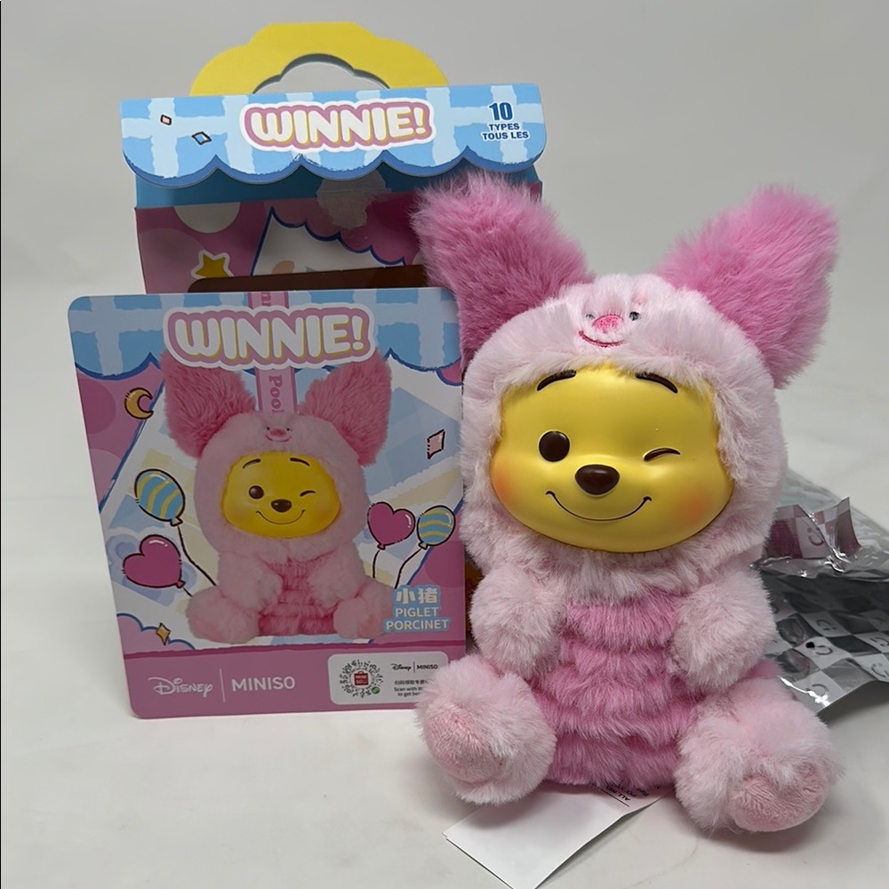 Miniso Winnie the Pooh as piglet plush keychain